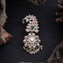 Emerald Curvette Brooch