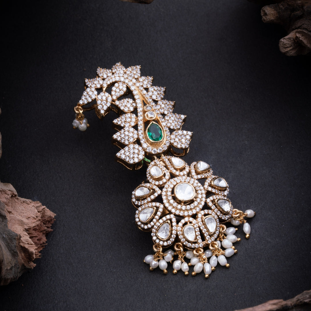 Emerald Curvette Brooch