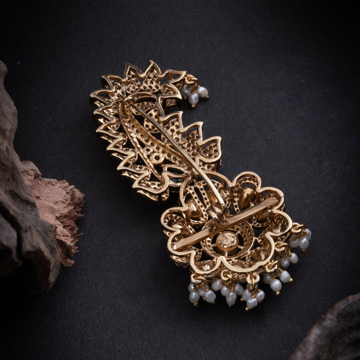 Emerald Curvette Brooch